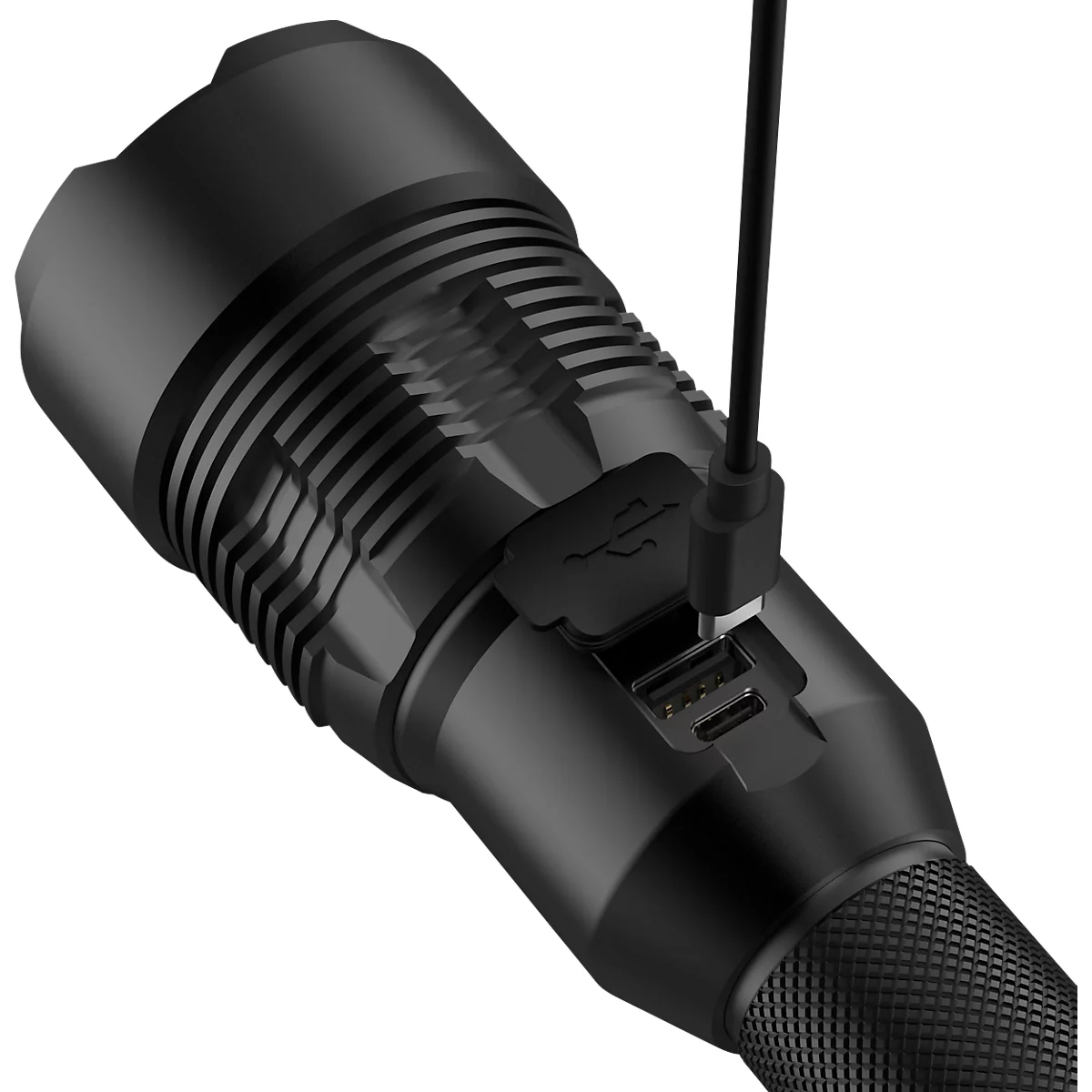 Black LED flashlight with USB port, being charged with a cable.