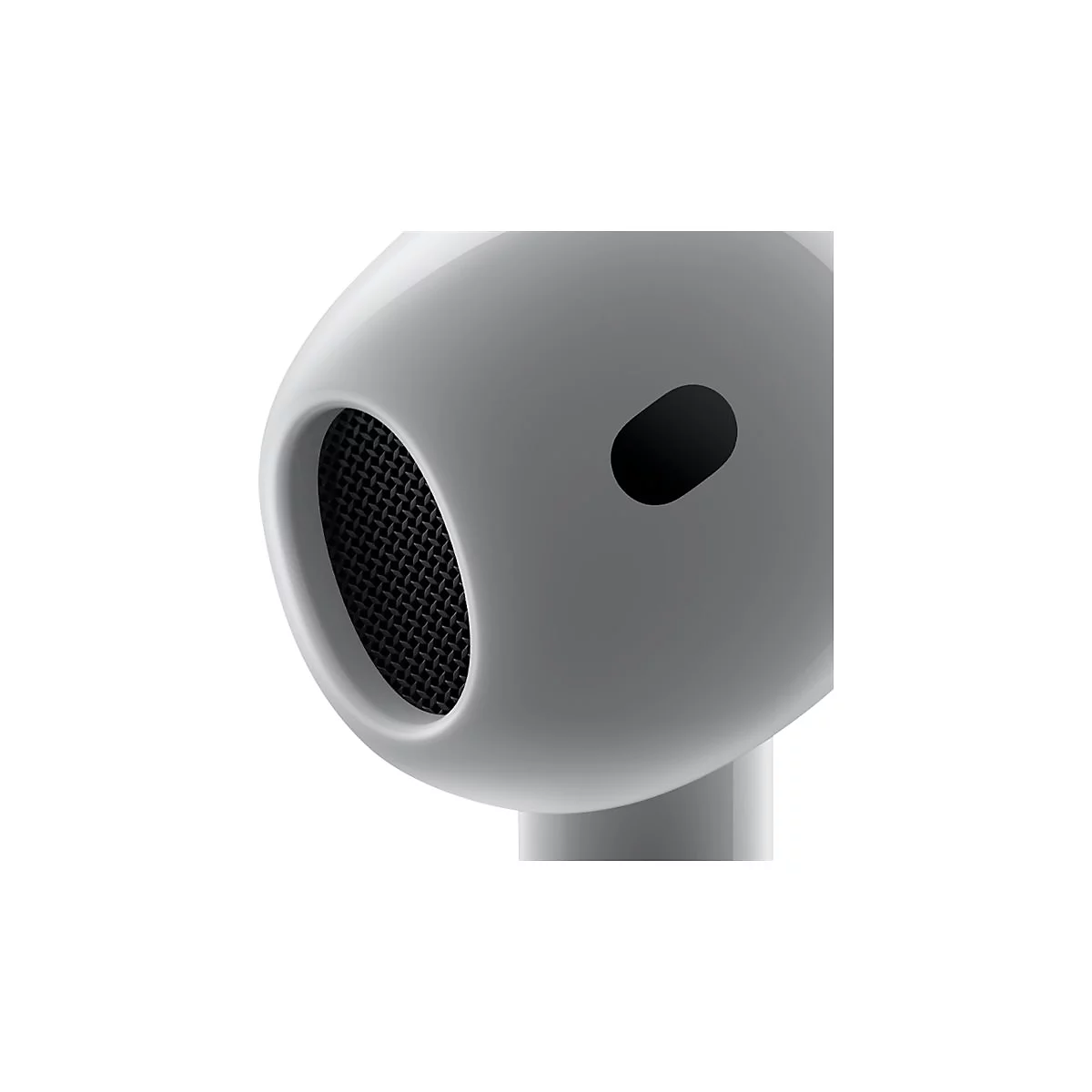 Gros plan sur un écouteur blanc. L'écouteur montre une maille noire dans un boîtier ovale avec un petit trou noir.