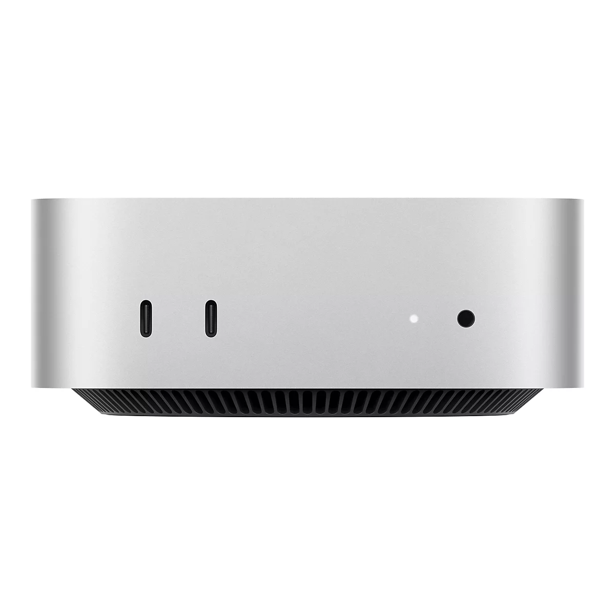 Silberfarbener Mac Mini, Frontansicht. Zwei USB-C Anschlüsse, eine Kontrollleuchte und ein Stromanschluss sind zu sehen.