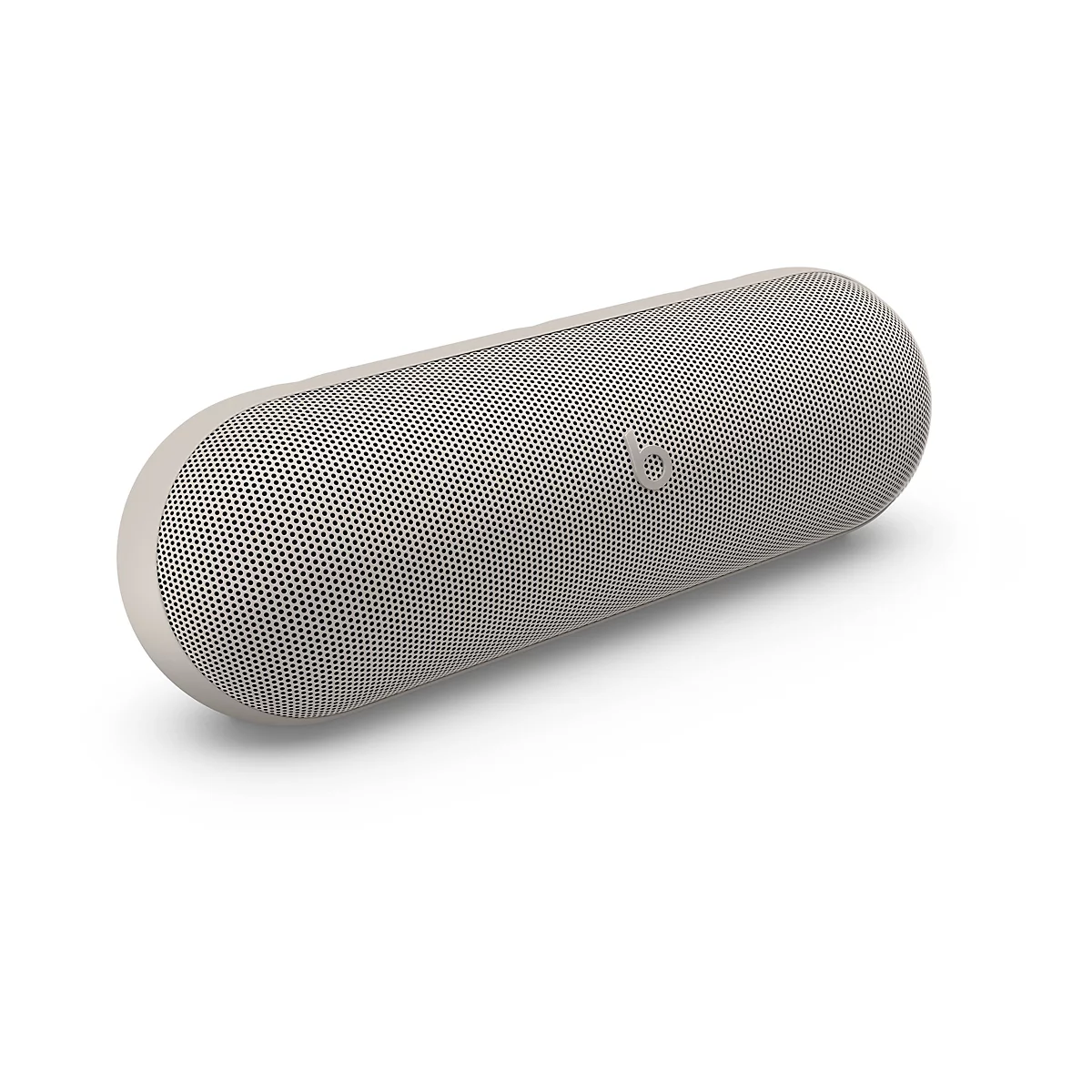 Beige Beats Pill Bluetooth-Lautsprecher in länglicher Kapselform vor weißem Hintergrund.