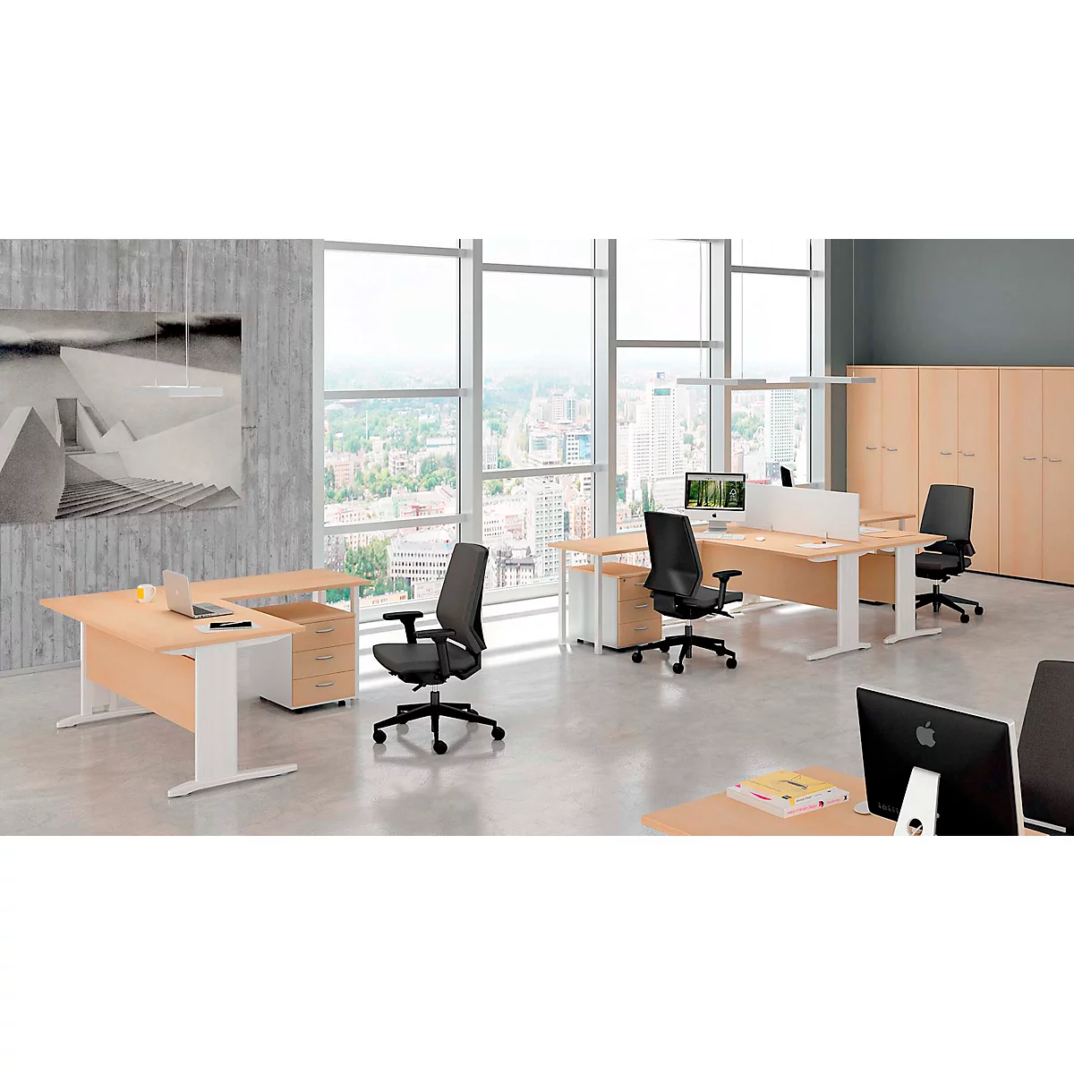 Office with desks, chairs, computers, and large windows overlooking the city.