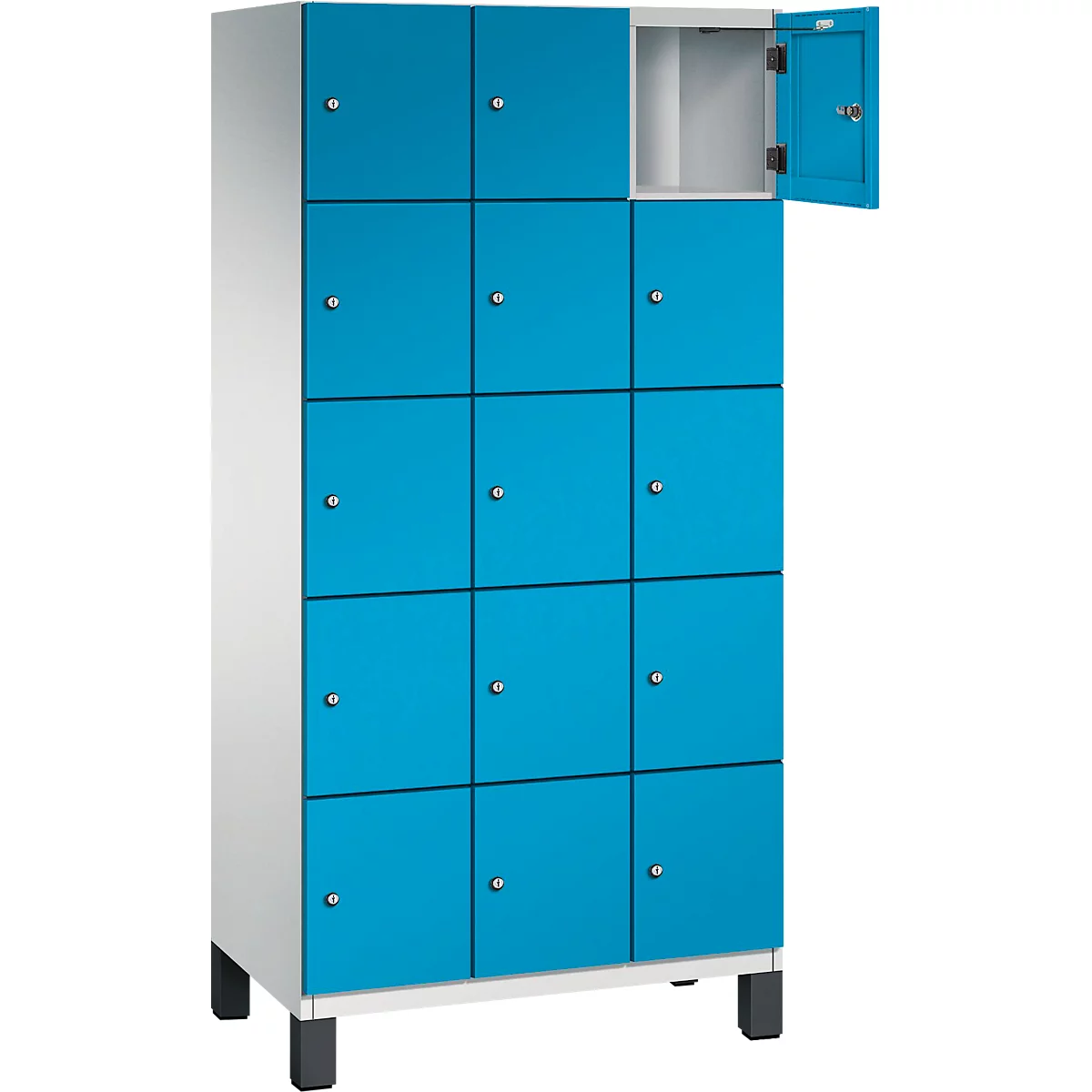 Un meuble bleu avec plusieurs compartiments, une porte ouverte.