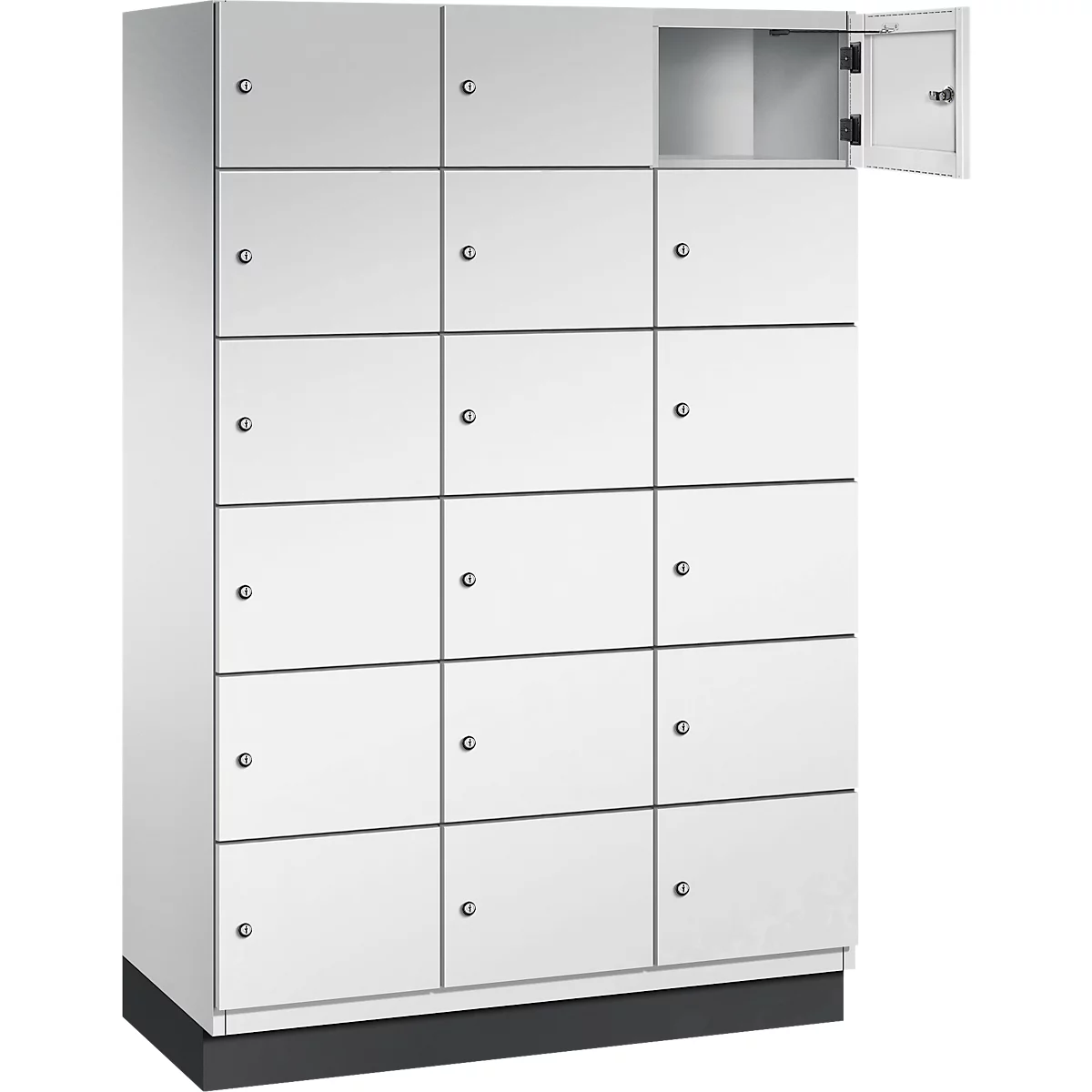 Armoire blanche avec plusieurs compartiments, une porte ouverte.