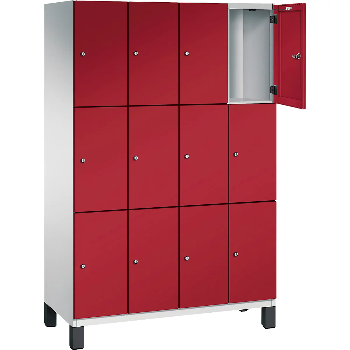 Armoire rouge avec plusieurs compartiments. Une porte est ouverte.