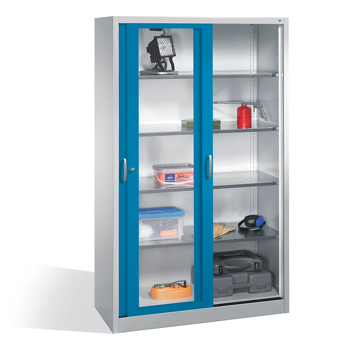 Armoire métallique grise avec portes coulissantes en verre bleu, remplie de divers outils et équipements.