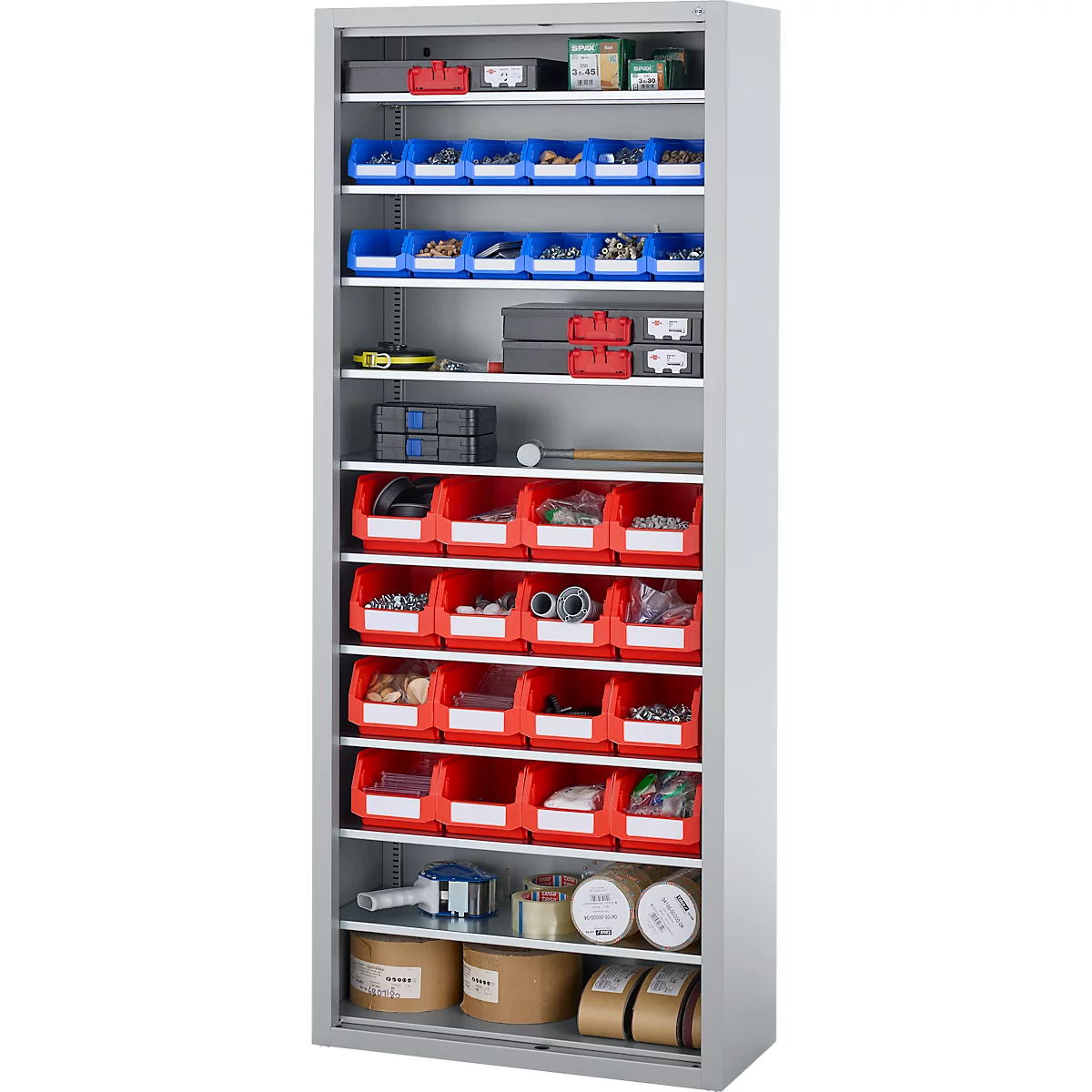 Armoire à outils grise avec de nombreux tiroirs remplis de vis, d'outils et de matériaux.