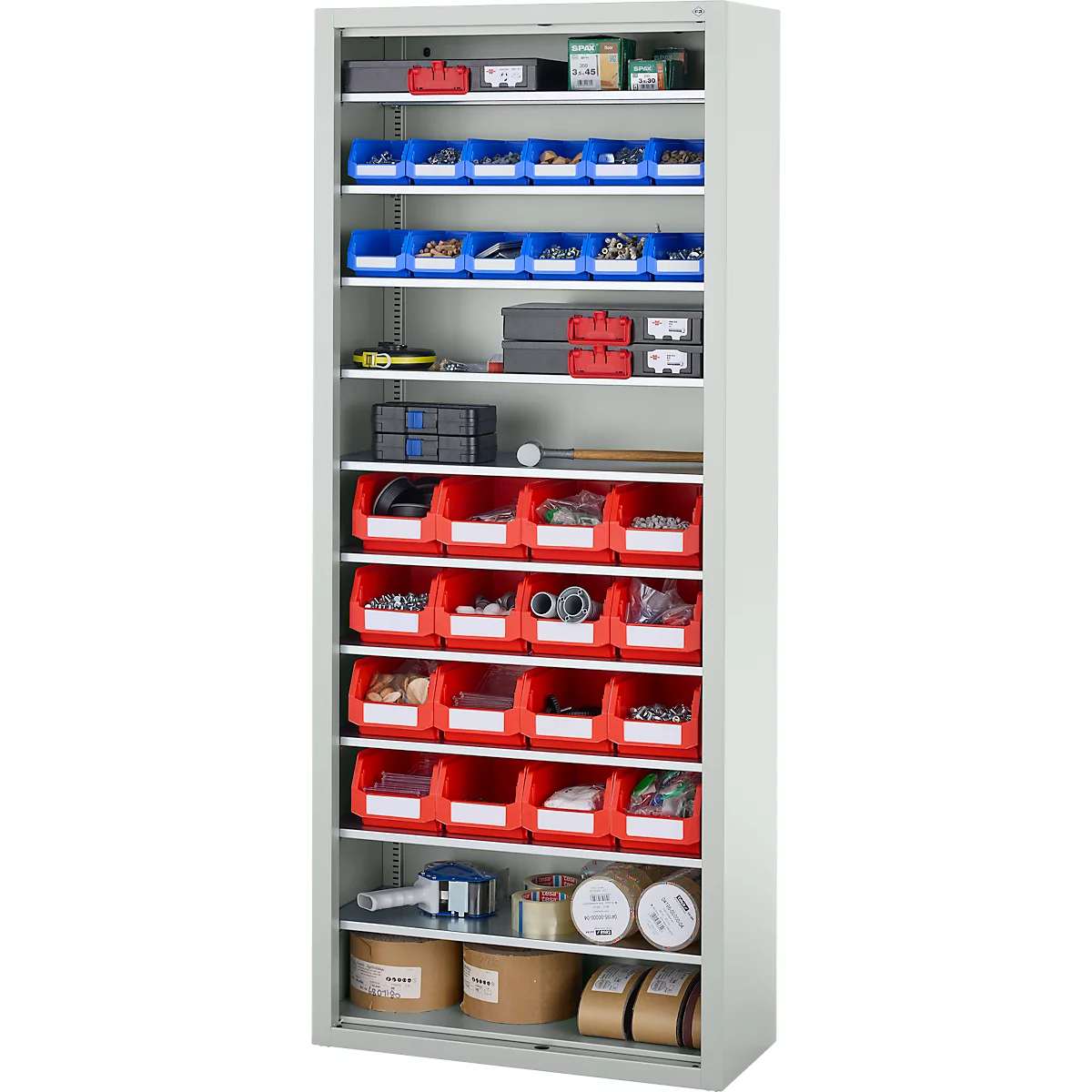 Armoire grise avec de nombreux tiroirs et conteneurs bleus et rouges, remplis d'outils et de petites pièces.