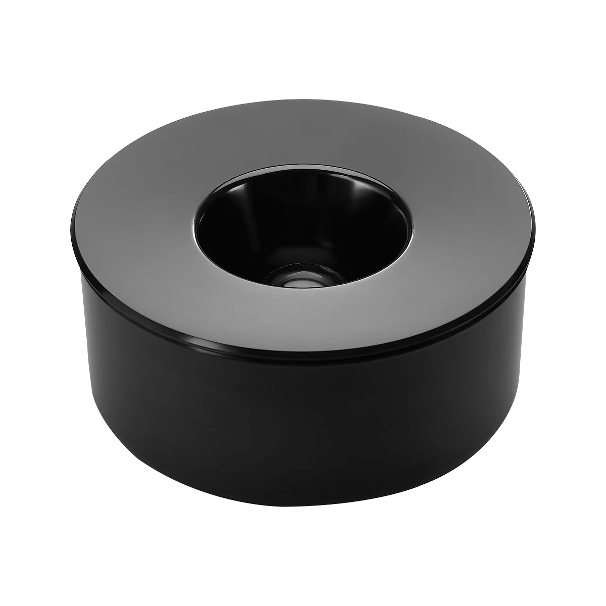 Black round object with a hole in the middle, shiny rim.