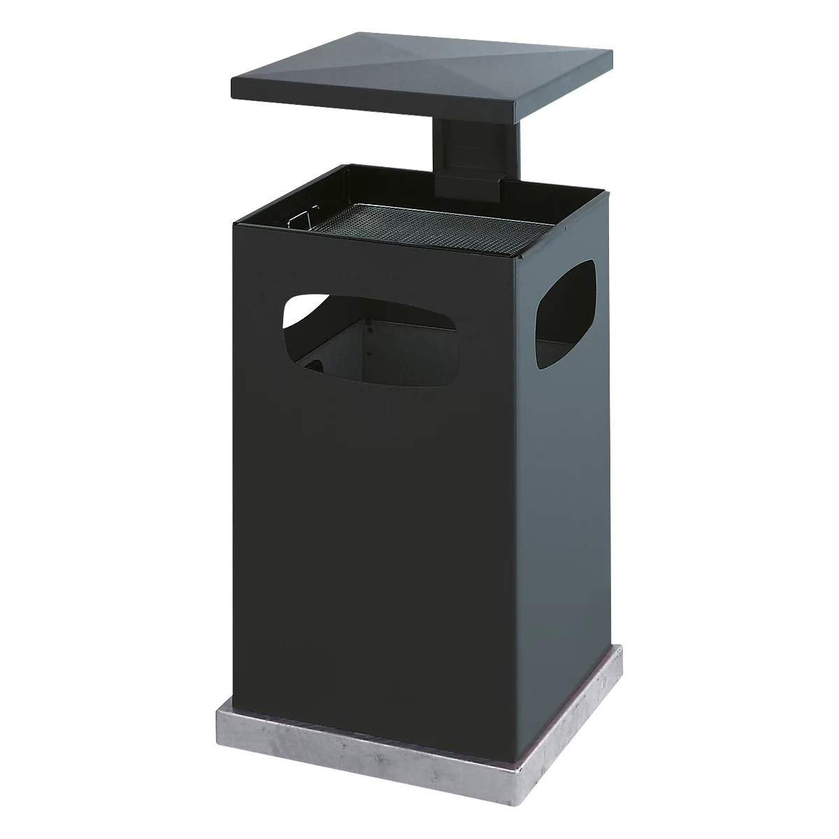 Black, rectangular waste container with a lid and cutouts. It stands on a concrete base.