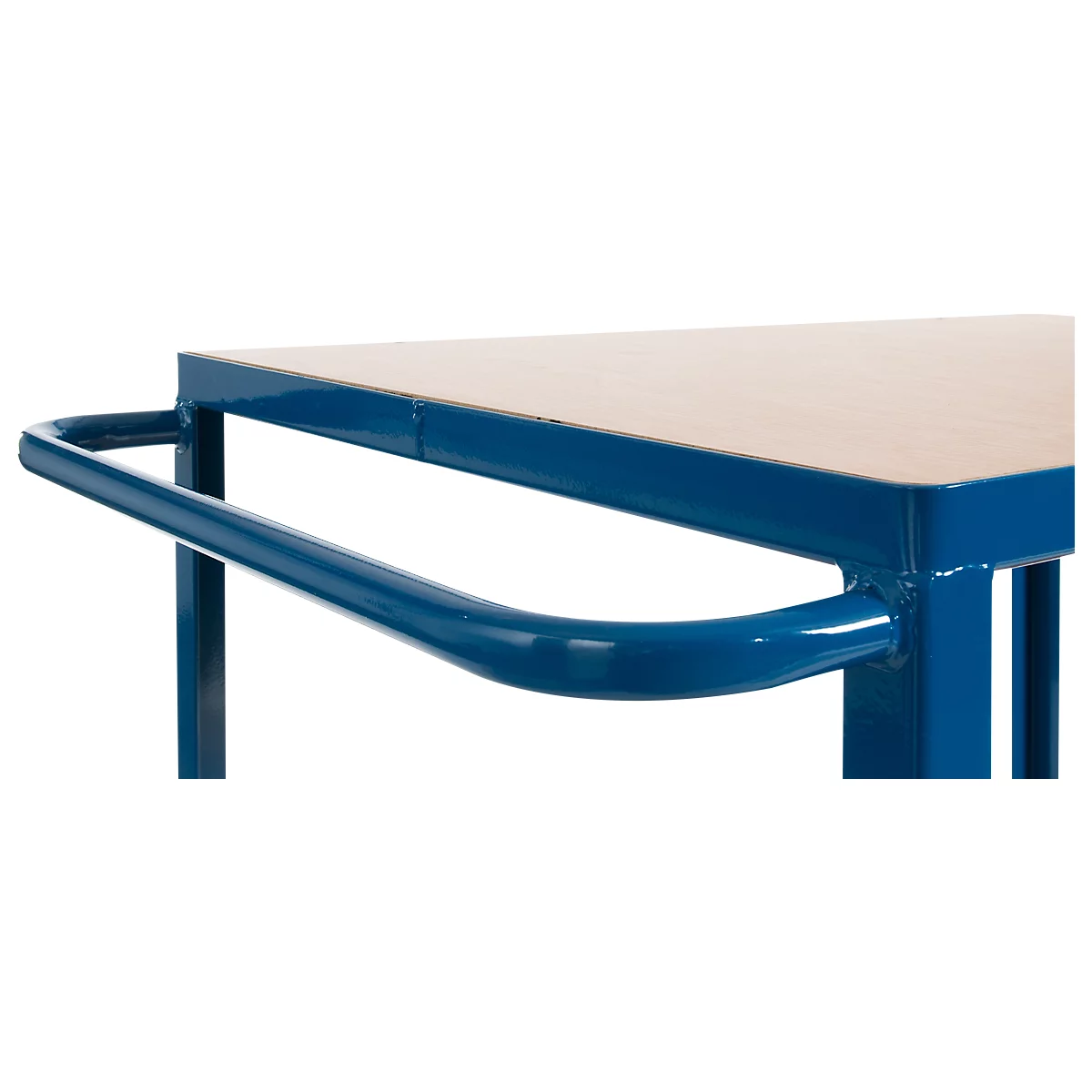 Close-up of a blue handle on a table. The table has a light wood top.