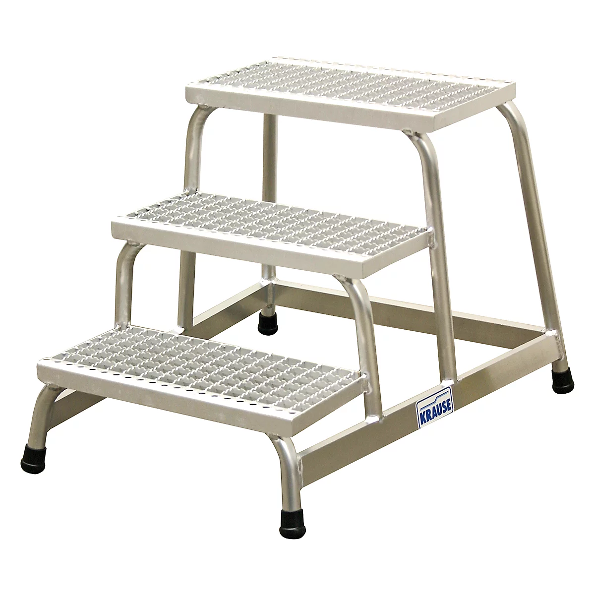 Silver stepladder with three steps and a grid pattern. Black rubber feet, the name "KRAUSE" is visible on the side.