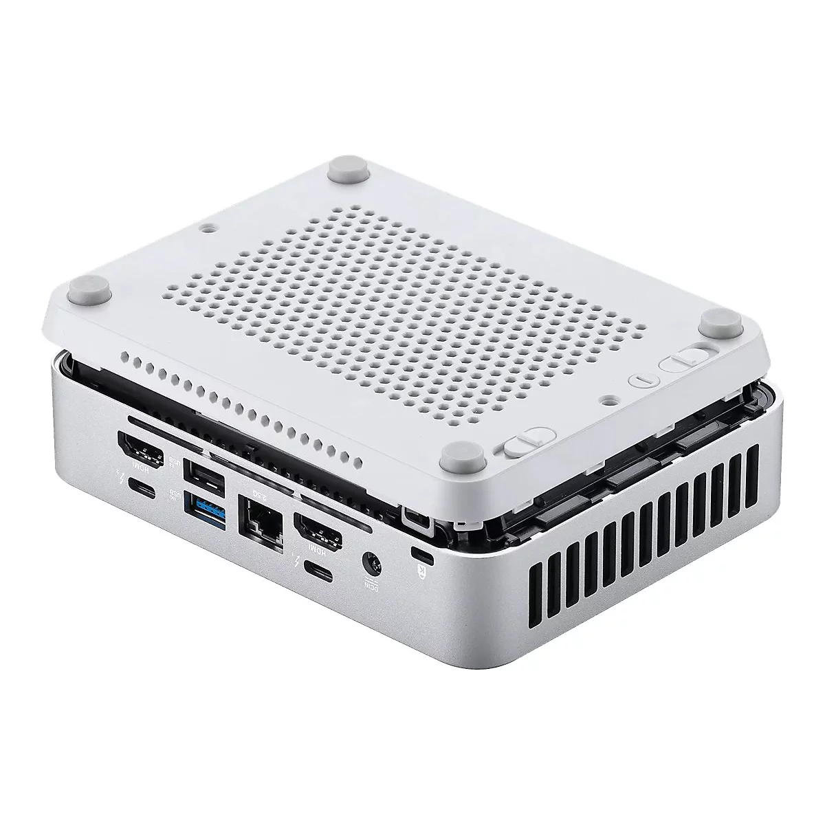 Mini-PC argenté avec couvercle blanc amovible montrant les ports.