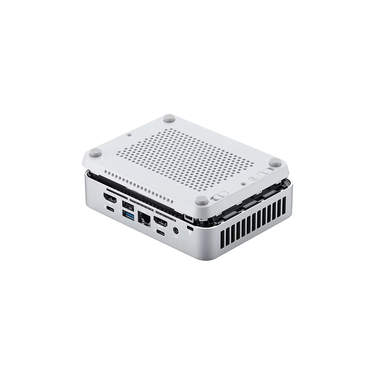 Grauer Mini-PC, Deckel teilweise geöffnet, zeigt Lüftungsgitter und Anschlüsse. Hellgraue Füße und Tasten. Hintergrund weiß.