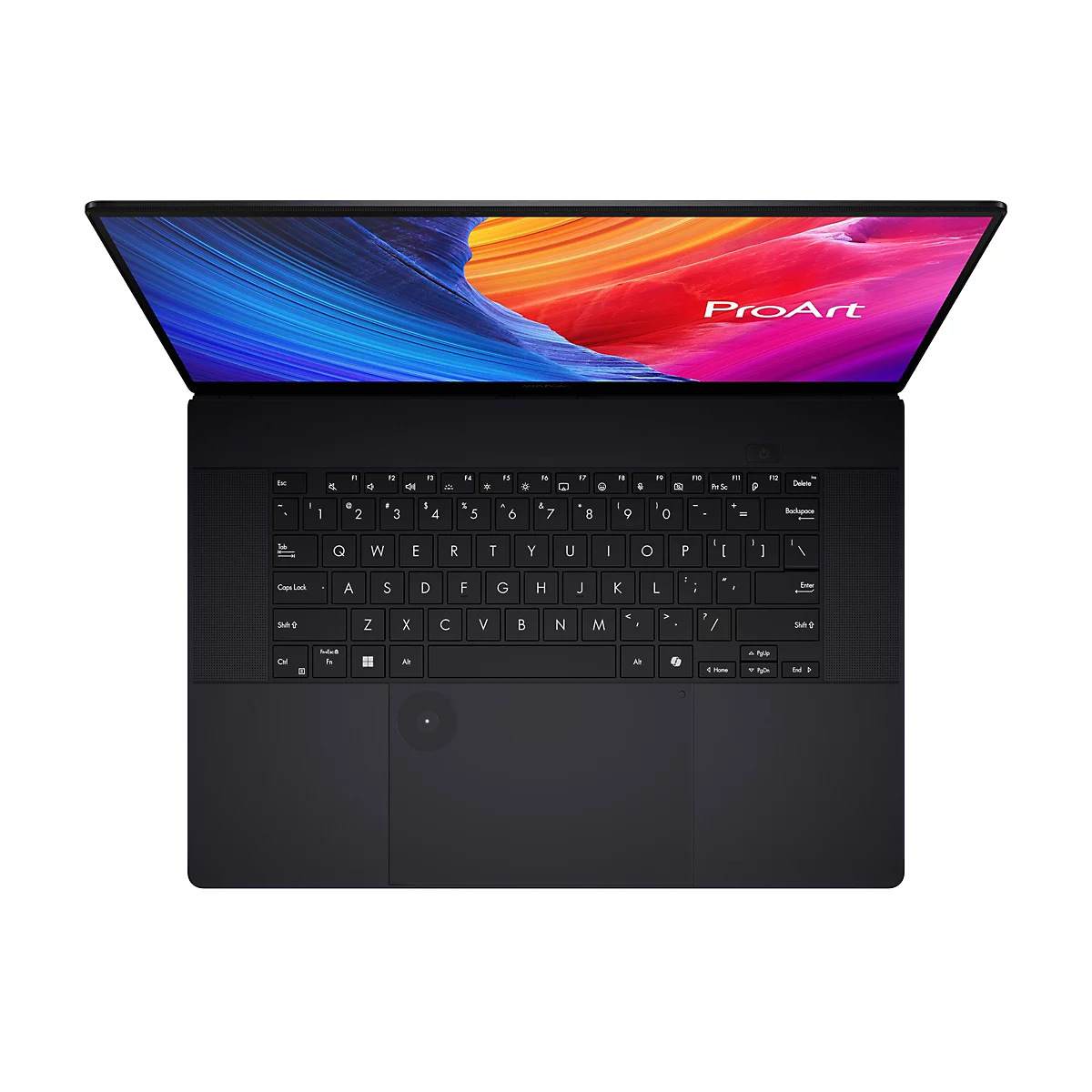 Draufsicht auf einen schwarzen Laptop mit geöffnetem Bildschirm. Auf dem Display sind Farben zu sehen, darunter Blau und Rot, sowie das Wort "ProArt". Die Tastatur ist beleuchtet.