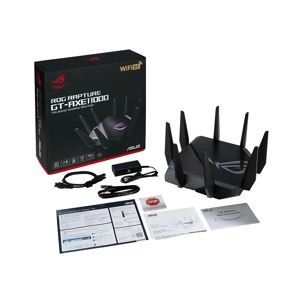 Schwarzer Router mit Antennen und ZubehÃ¶r vor weiÃŸem Hintergrund. Die Verpackung zeigt den Markennamen ROG Rapture GT-AXE11000.