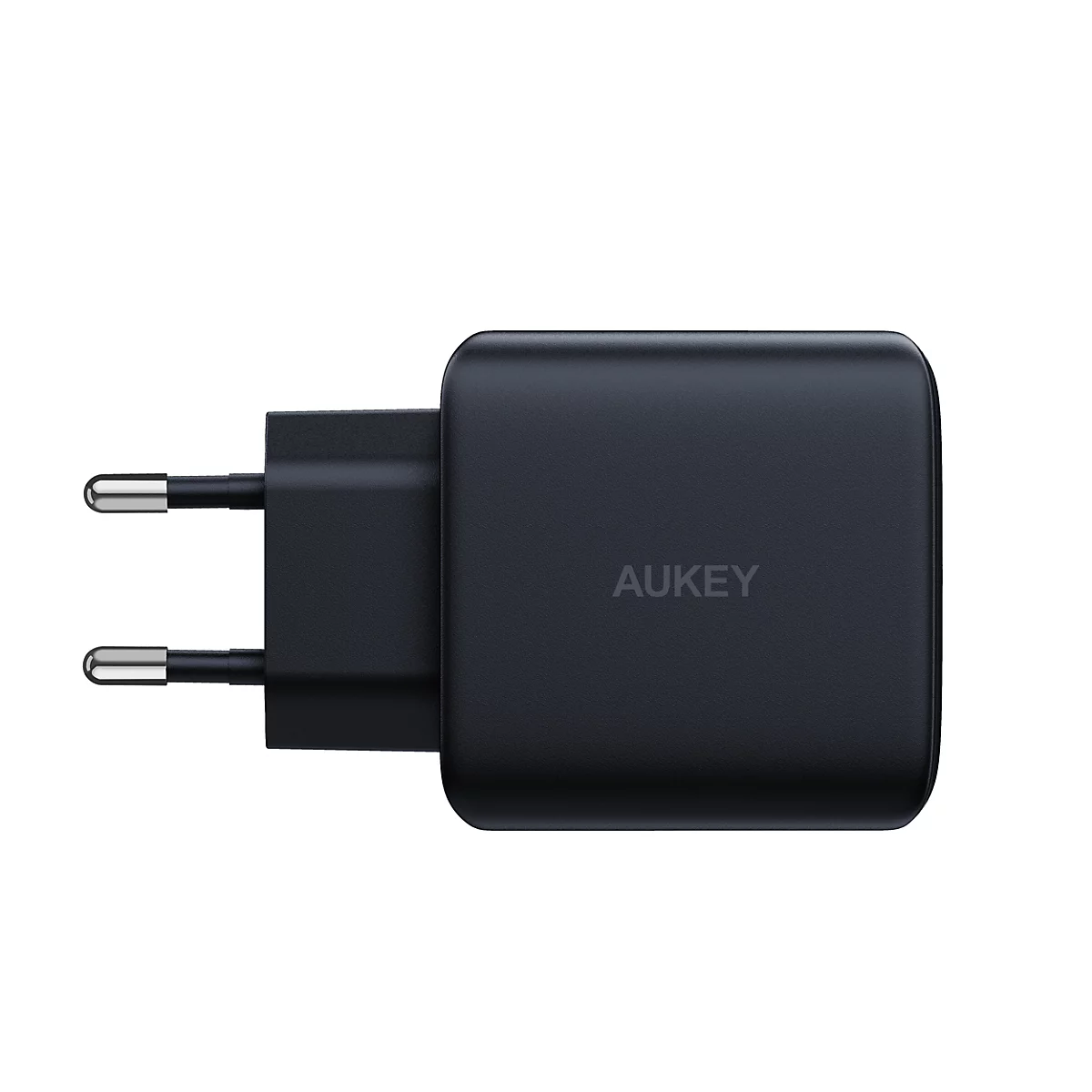 Un adaptateur secteur noir avec le logo "AUKEY" sur fond blanc. Deux broches argentées sont visibles.