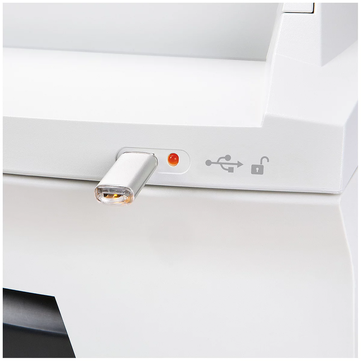 A white device with a silver USB-C connector plugged in. Next to it are a red LED and USB symbols.