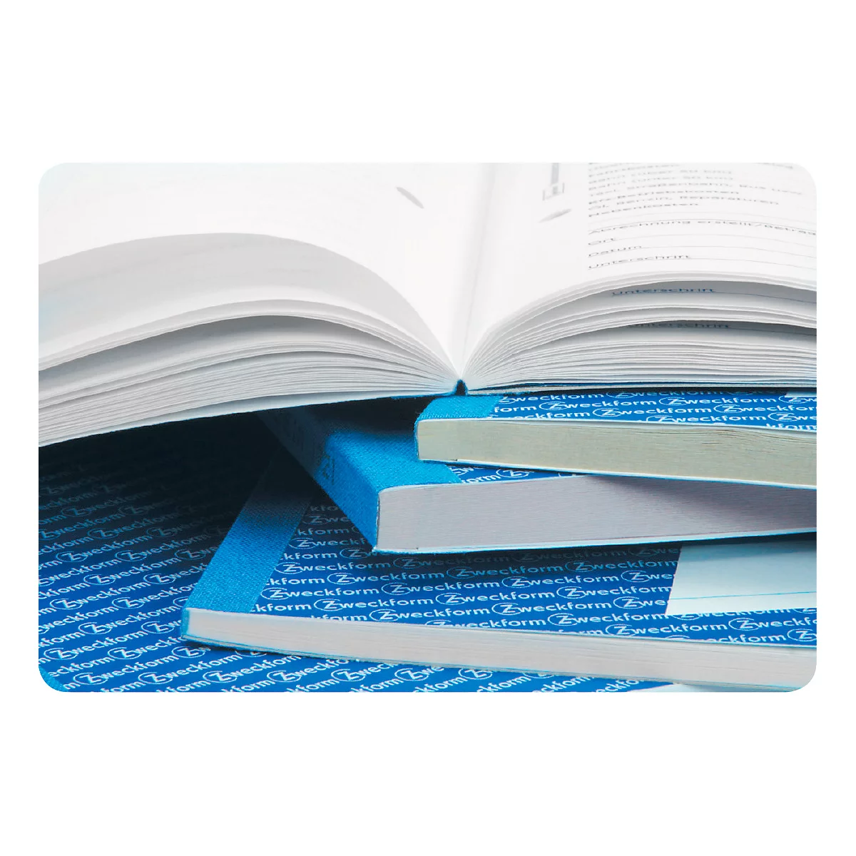 Open white book pages rest on blue and white bound books, the spines read "Zweckform".