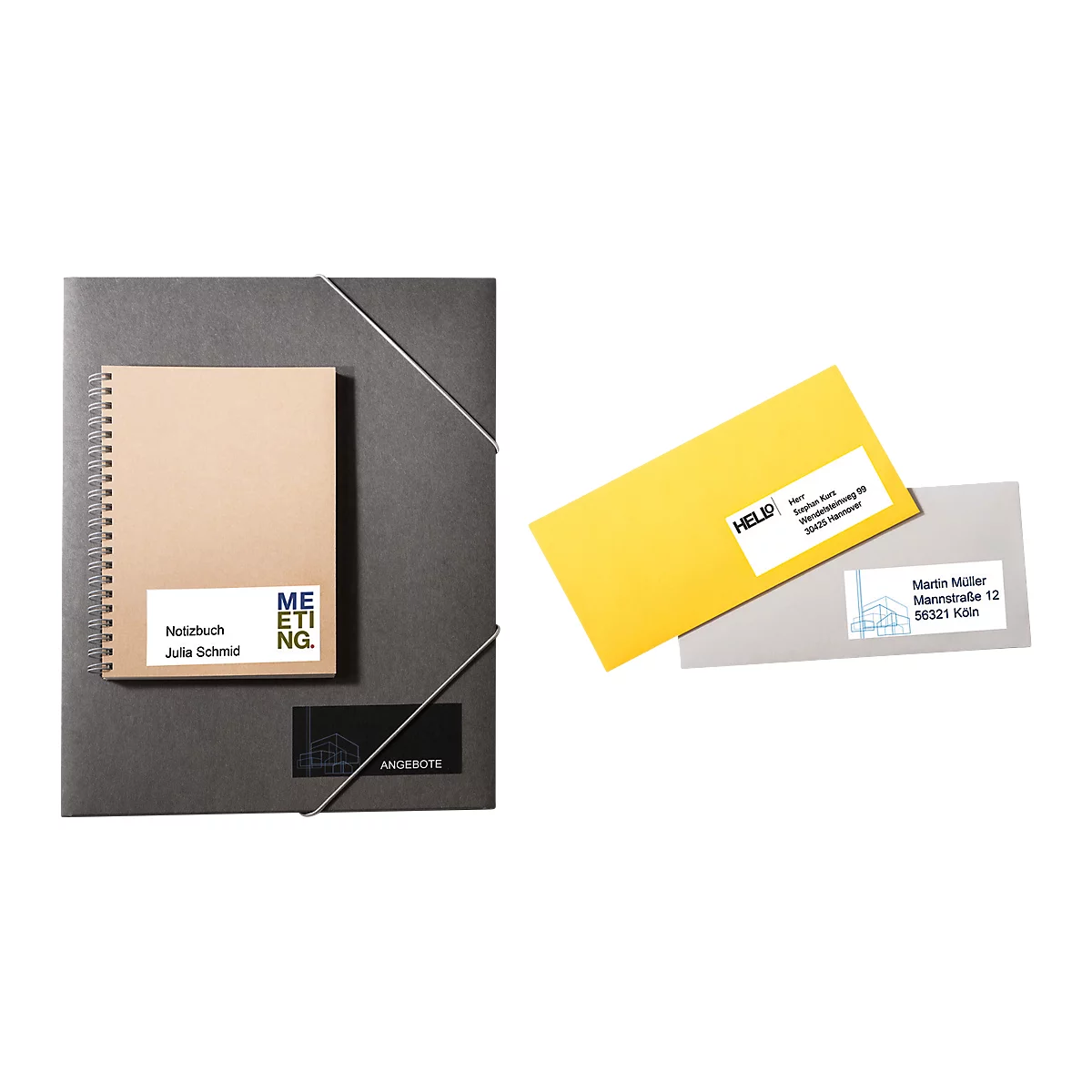 Notebook with label and envelopes with stickers. Black folder in the background.