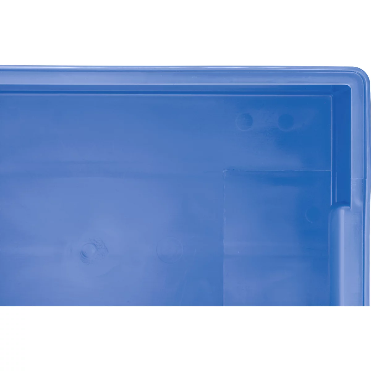 Gros plan sur le coin d'une boîte en plastique bleue avec un cadre visible.