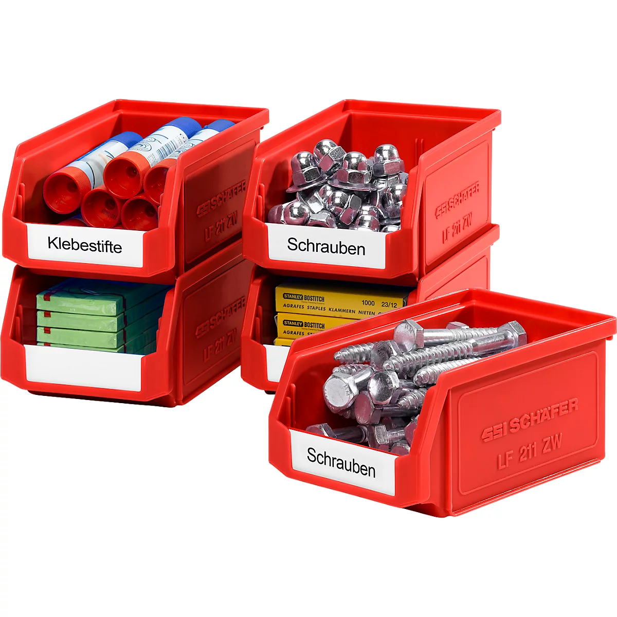 Plusieurs bacs de stockage rouges étiquetés sont remplis de bâtons de colle, de vis et d'outils.