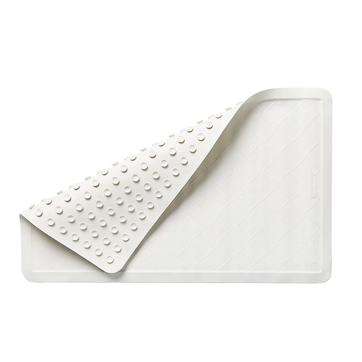Witte douchemat met zuignappen aan de onderkant, één hoek is omgeklapt.