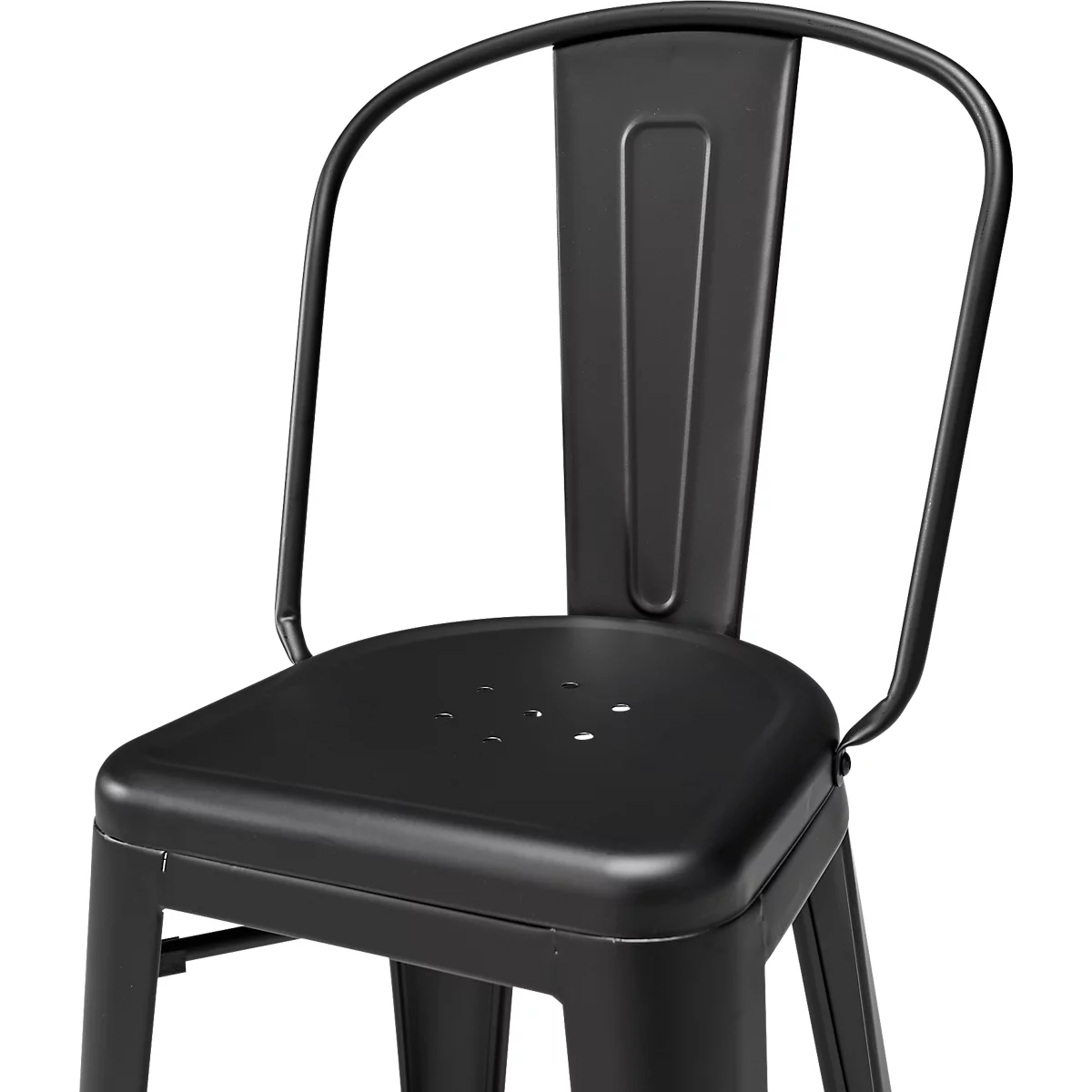 Black bar stool. Metal frame with a rounded back and a seat with a hole pattern. Close-up.