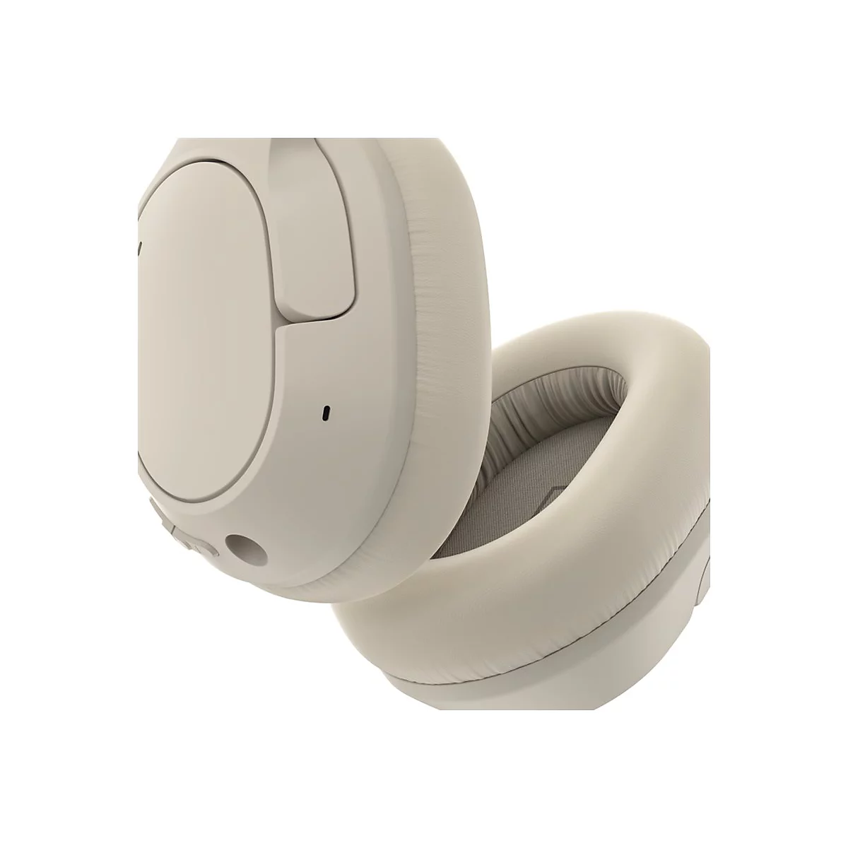 Casque beige, plan rapproché. Un écouteur est ouvert pour montrer la doublure intérieure.