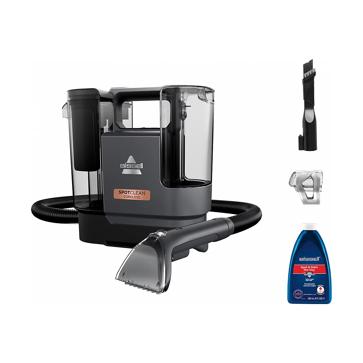 Drahtloser Bissell SpotClean Teppichreiniger mit Zubehör und Reinigerflasche.