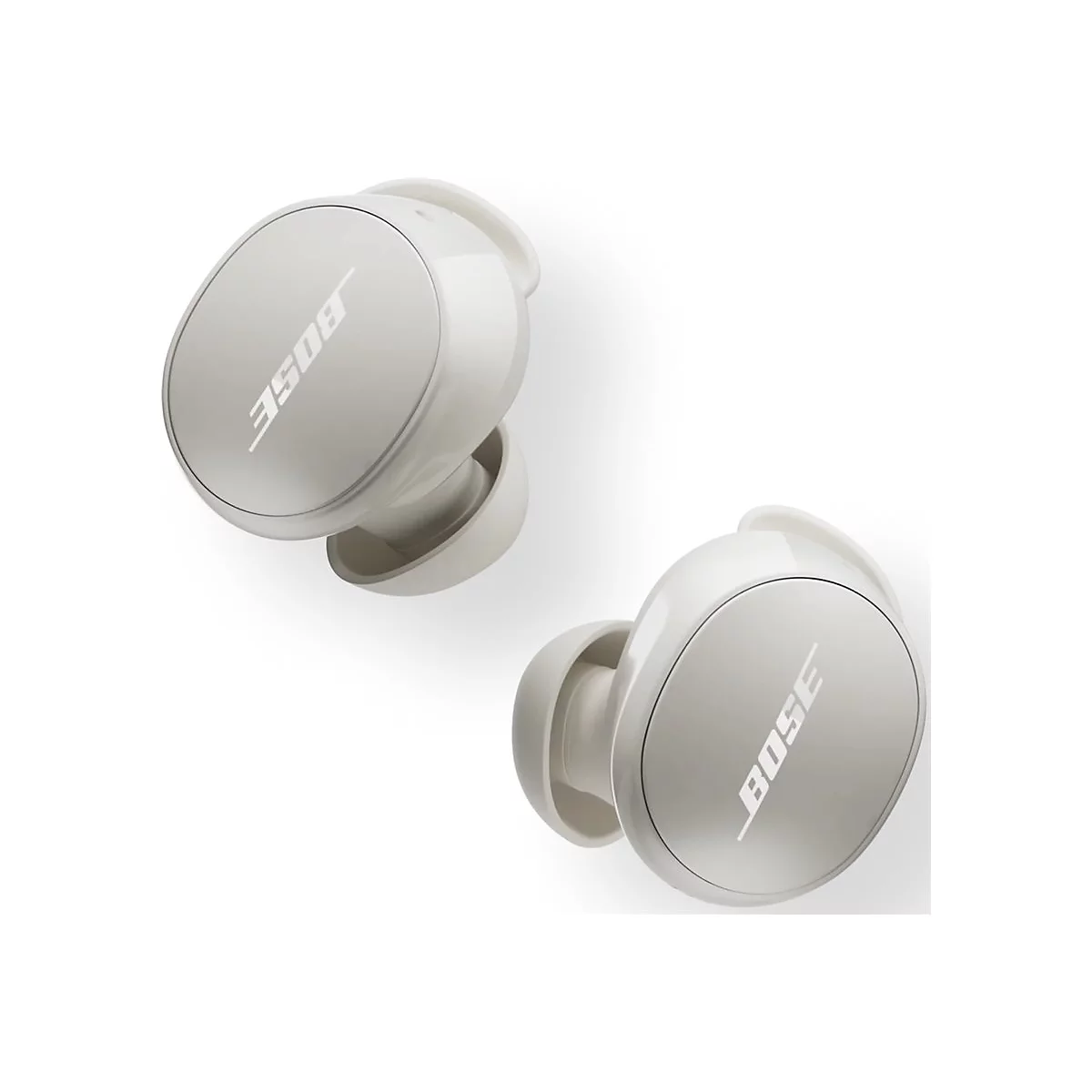 Zwei cremeweiße Bose In-Ear-Kopfhörer vor weißem Hintergrund.