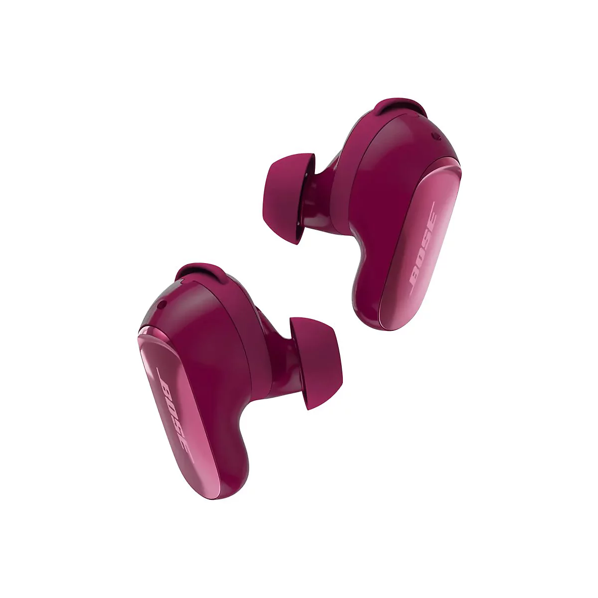 Zwei tiefrote Bose In-Ear-Kopfhörer vor weißem Hintergrund.