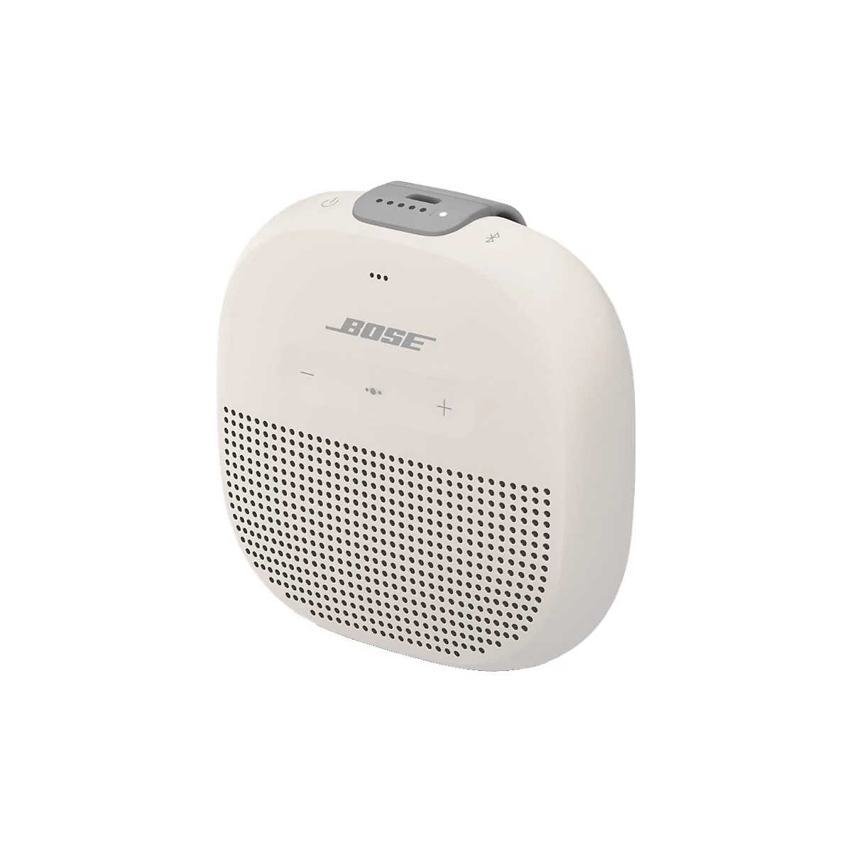 Kompakter, beiger Bose Bluetooth-Lautsprecher vor weißem Hintergrund mit Lautstärketasten und Bose-Logo.