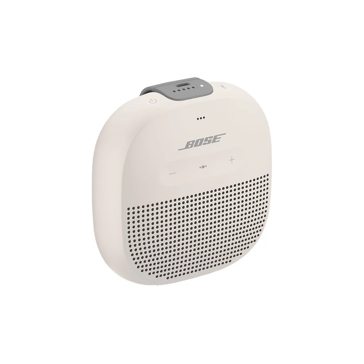 Kompakter, beiger Bose Bluetooth-Lautsprecher vor weißem Hintergrund mit Tasten und Lautsprechergitter.