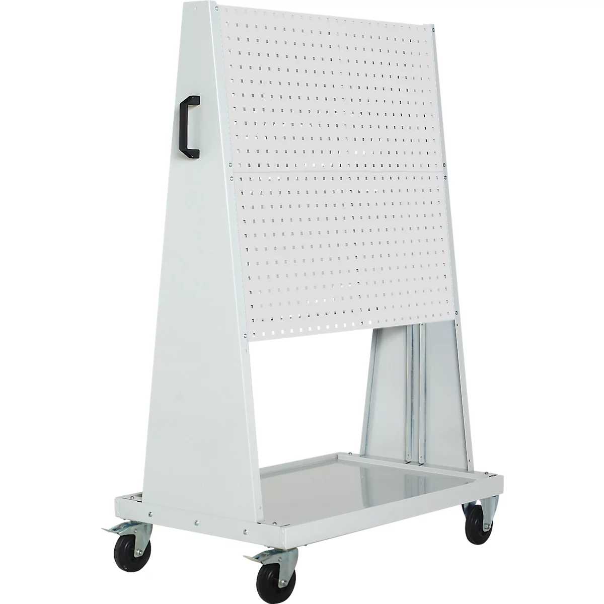 Weißer Lochwandschrank auf Rollen mit schwarzem Griff. Die Lochwand hat viele kleine Löcher.