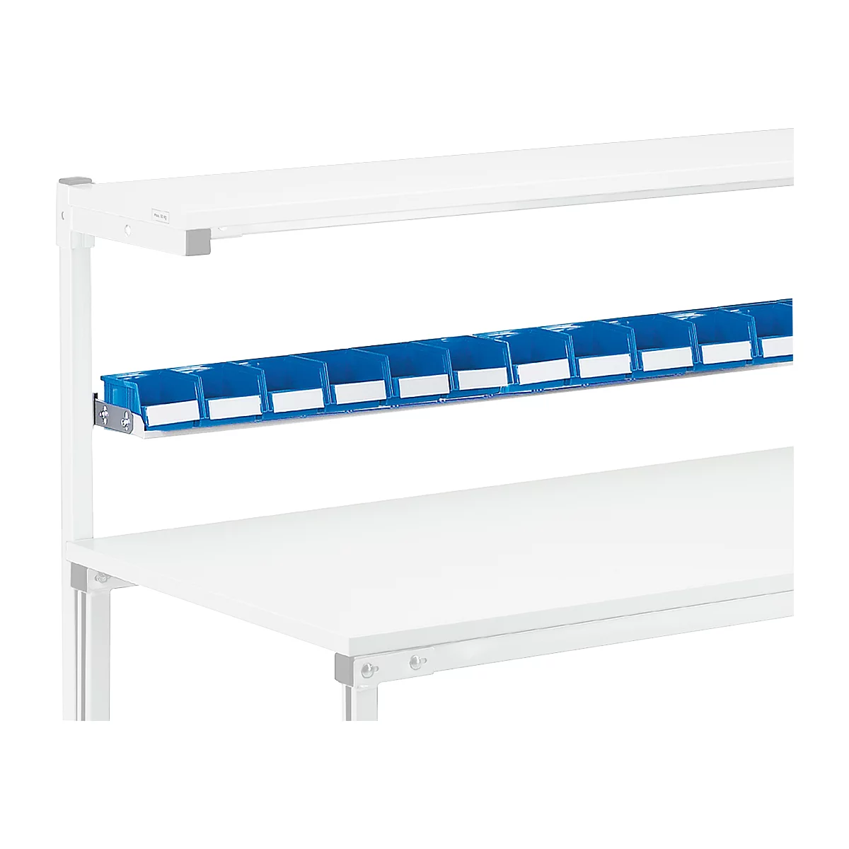 Blue assortment boxes with white labels hanging above a white desk. Above is a white shelf with lighting.