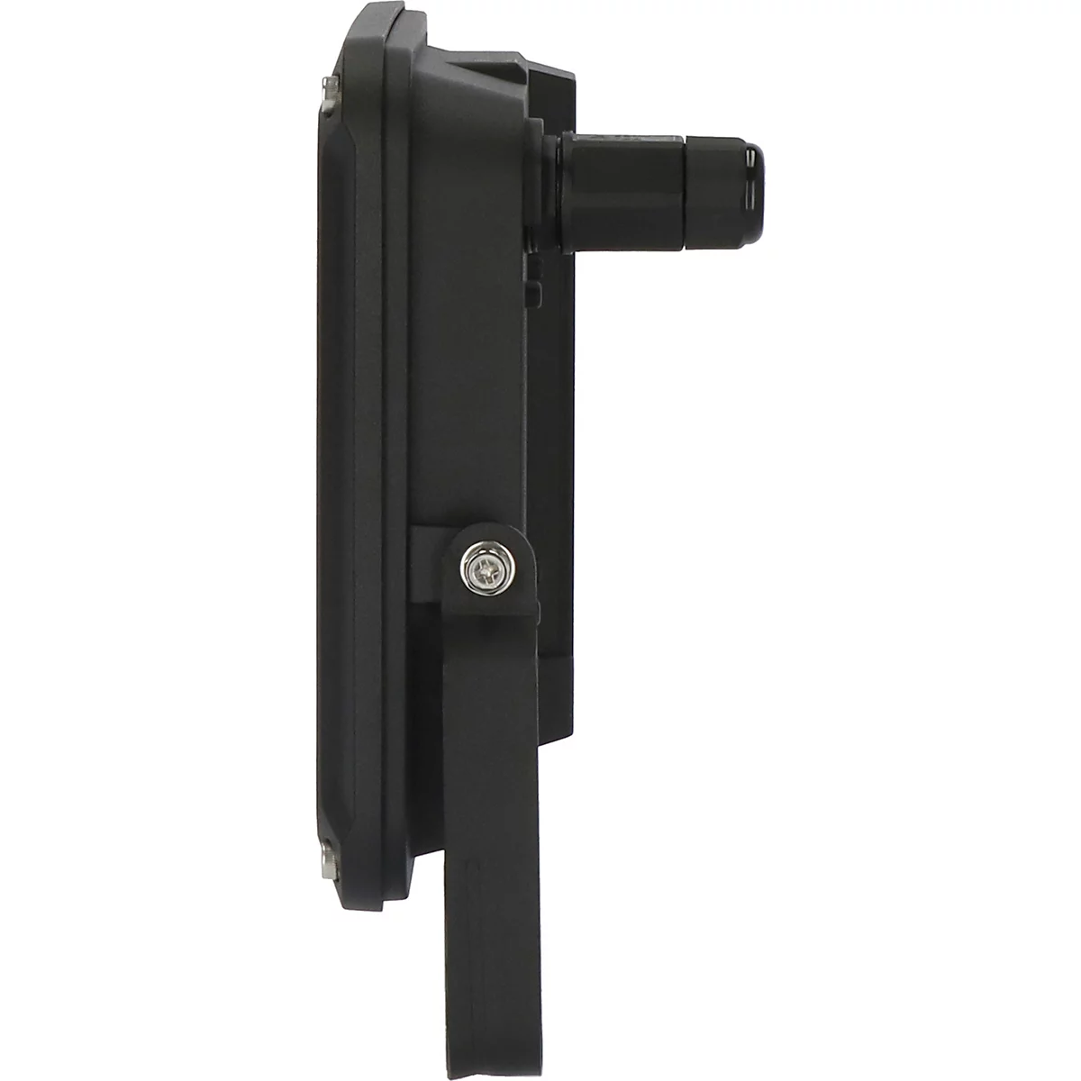 Ecke eines Gebäudes mit grauer Garagentür, weißer Wand und einer Lampe. Dach aus Holz und Metall.