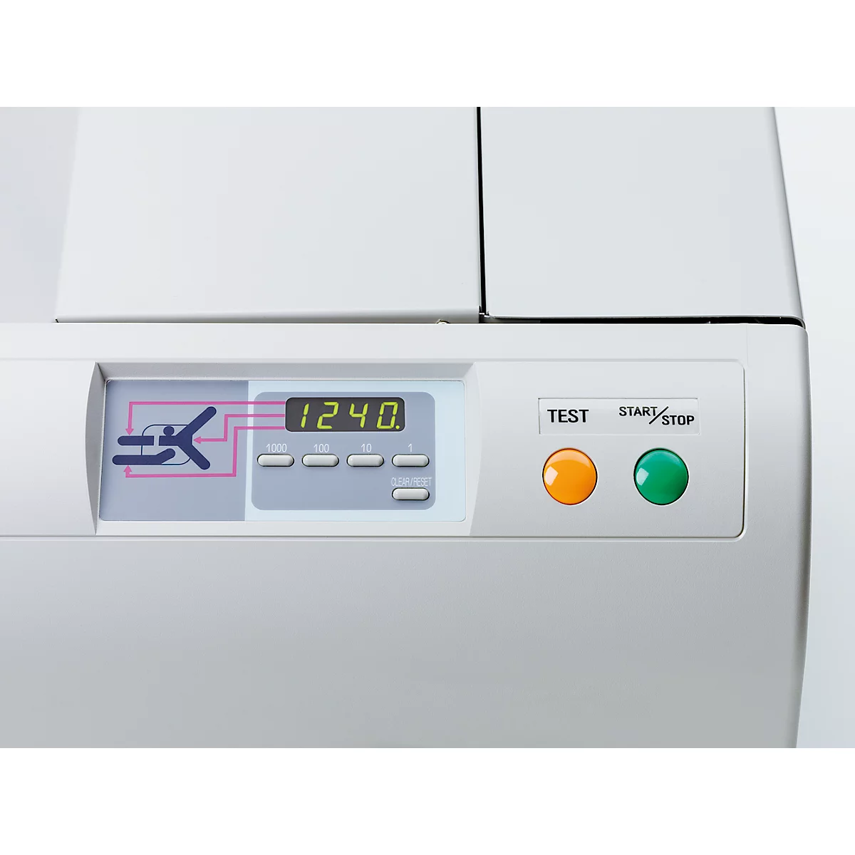Nahaufnahme einer weißen Maschine mit Display und Knöpfen. Auf dem Display: 1240. Darunter zwei Knöpfe: Orange TEST, grün START/STOP.