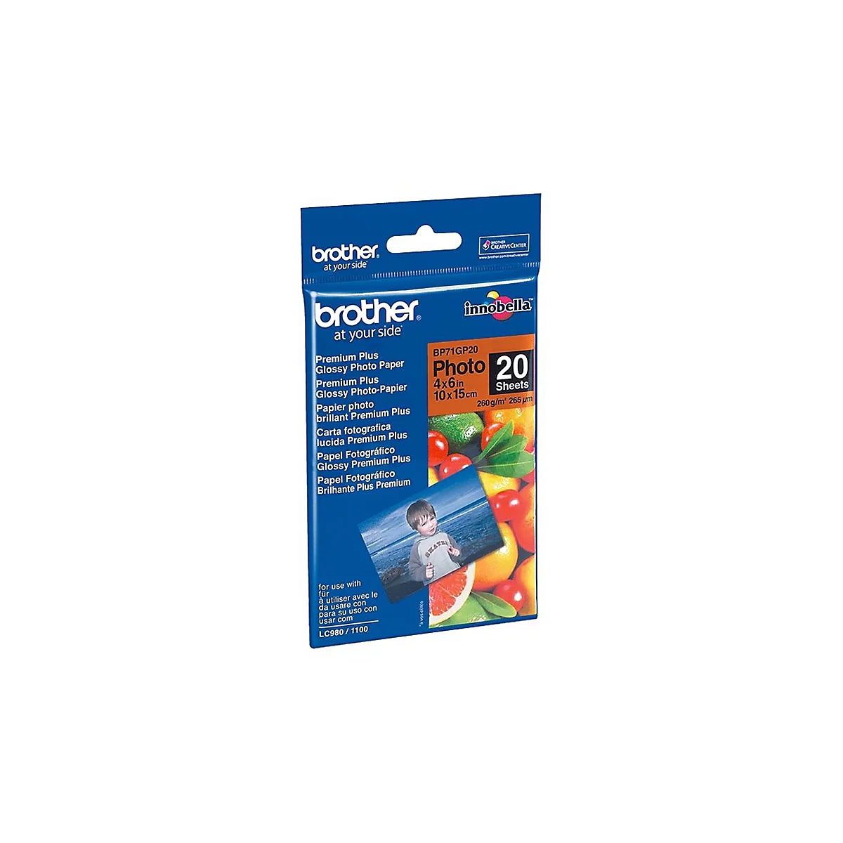 Blaue Brother Fotopapier-Verpackung mit Obst-Abbildung und einem Foto eines Kindes am Strand.