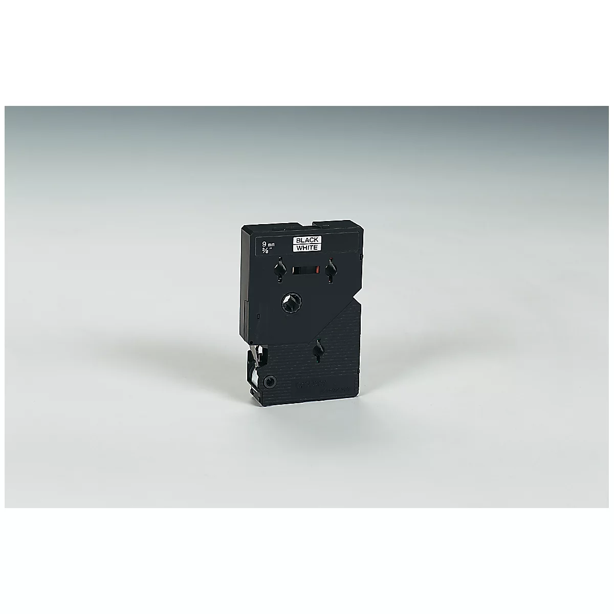 A black electronic device with black lettering and the label "Black & White".