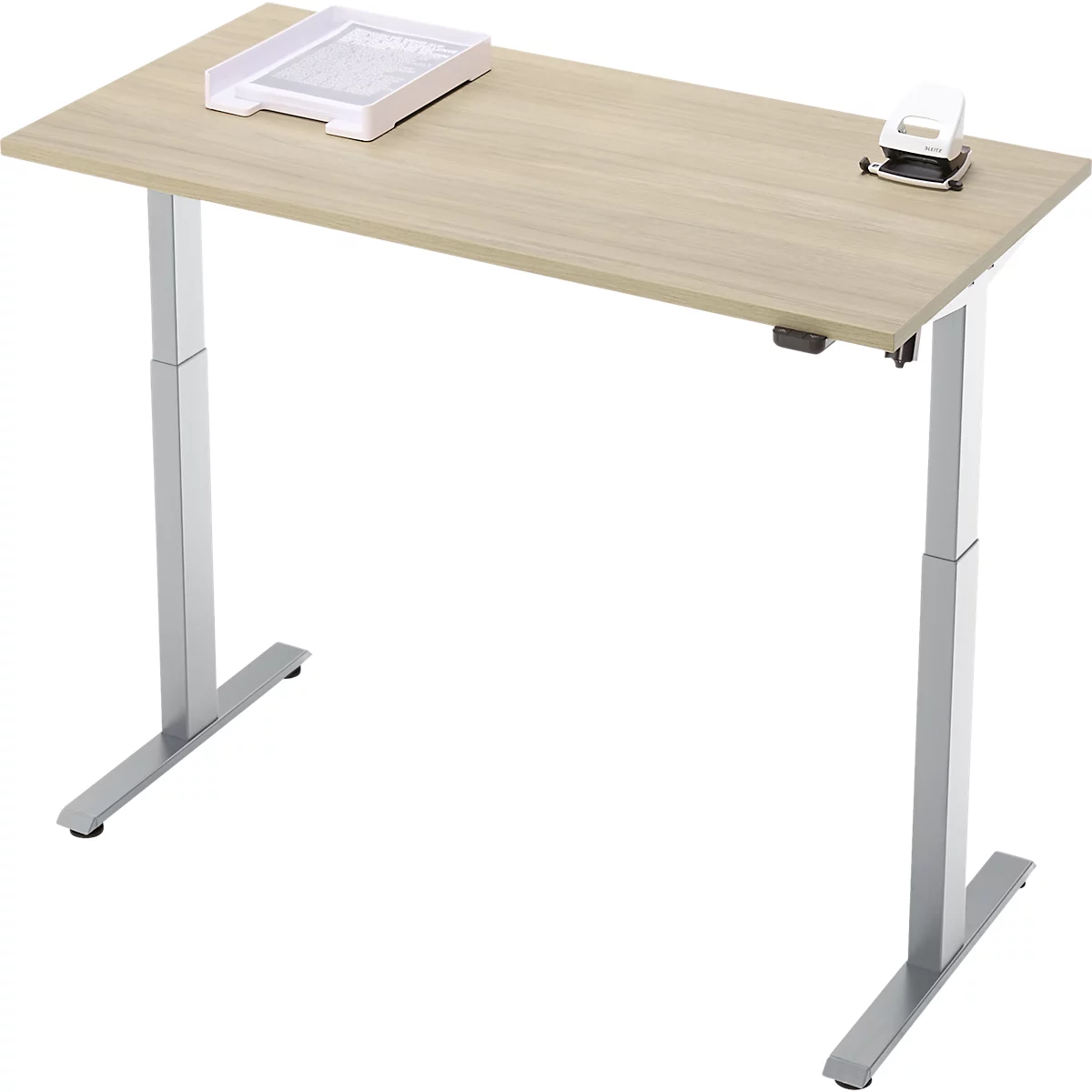 Een lichte bureau met in hoogte verstelbare poten, met een papieren bak en een perforator erop.