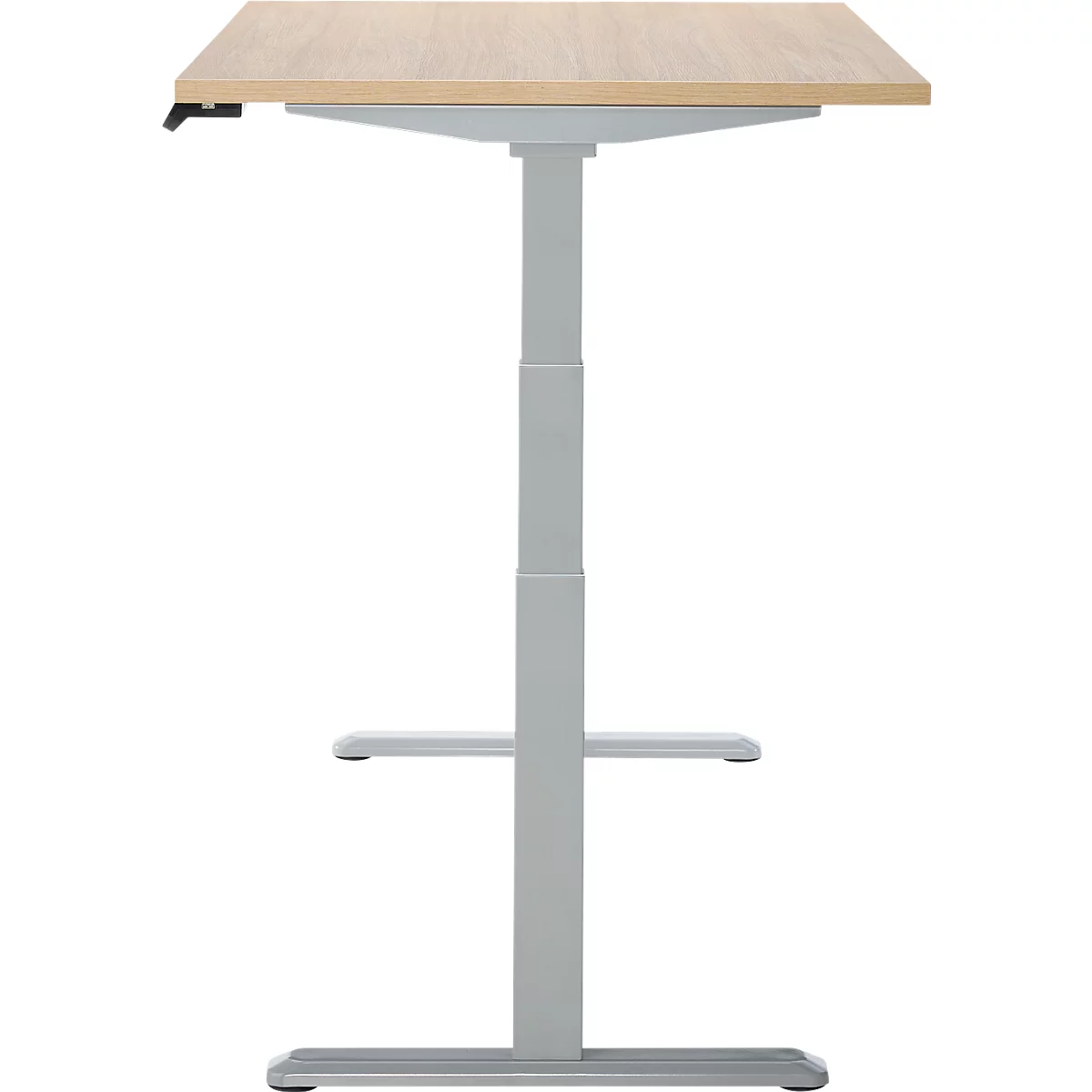 Un bureau debout avec un plateau de table brun clair, un cadre gris et deux repose-pieds.