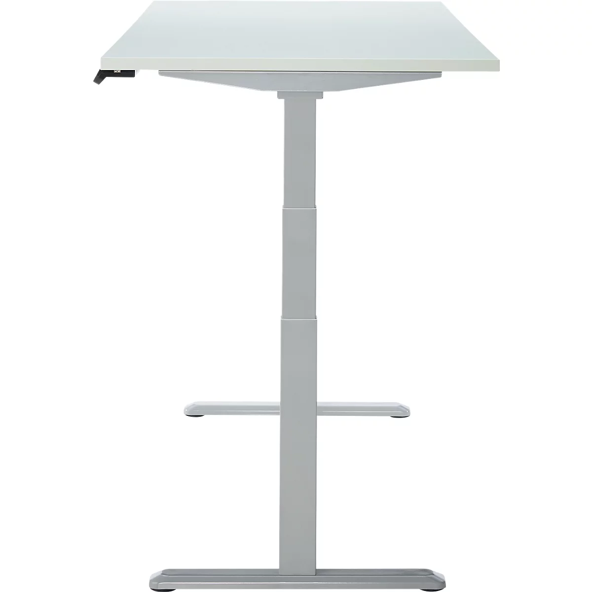 Un bureau blanc réglable en hauteur, photographié de face.
