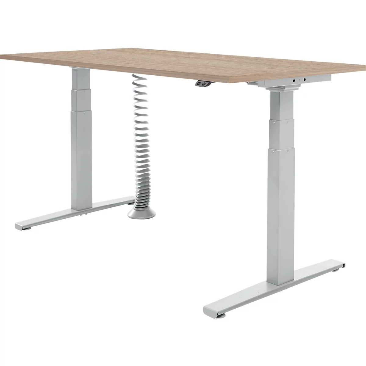 Bureau réglable en hauteur avec plateau en bois, piétement argenté et goulotte de câbles en spirale.