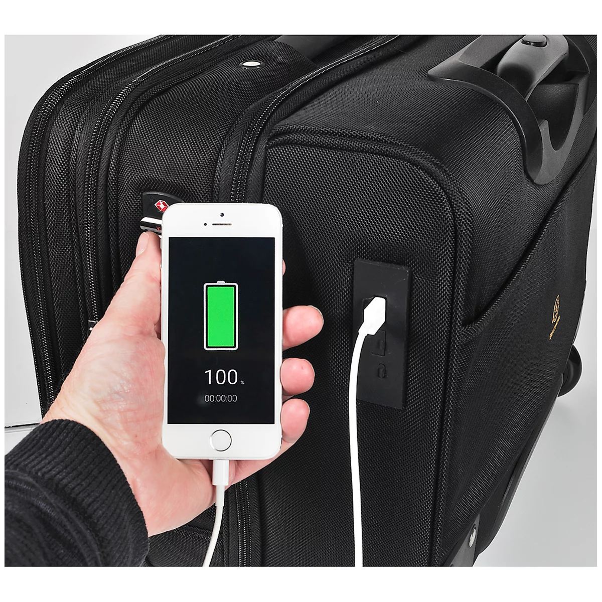 Black trolley with USB port. A smartphone displays 100% battery charge.