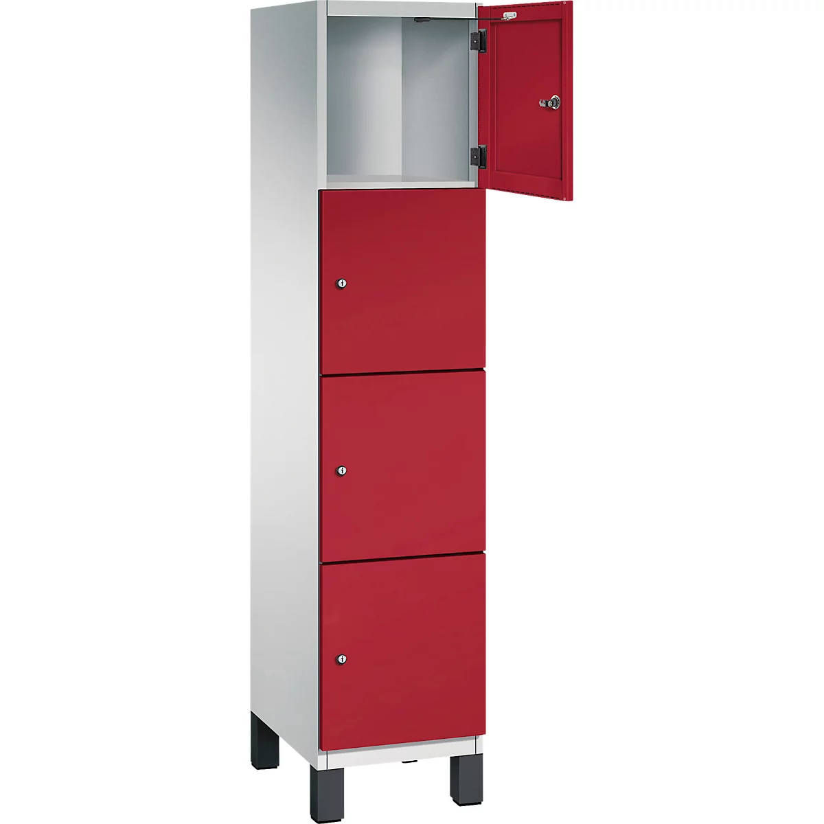 Kast met drie rode deuren en open rode deur erboven. Zilverkleurige behuizing, zwarte poten.