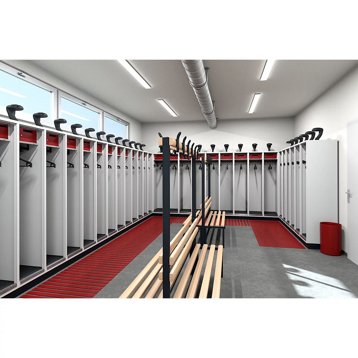 Locker room with lockers, benches and red floor. Ceiling lights and windows.