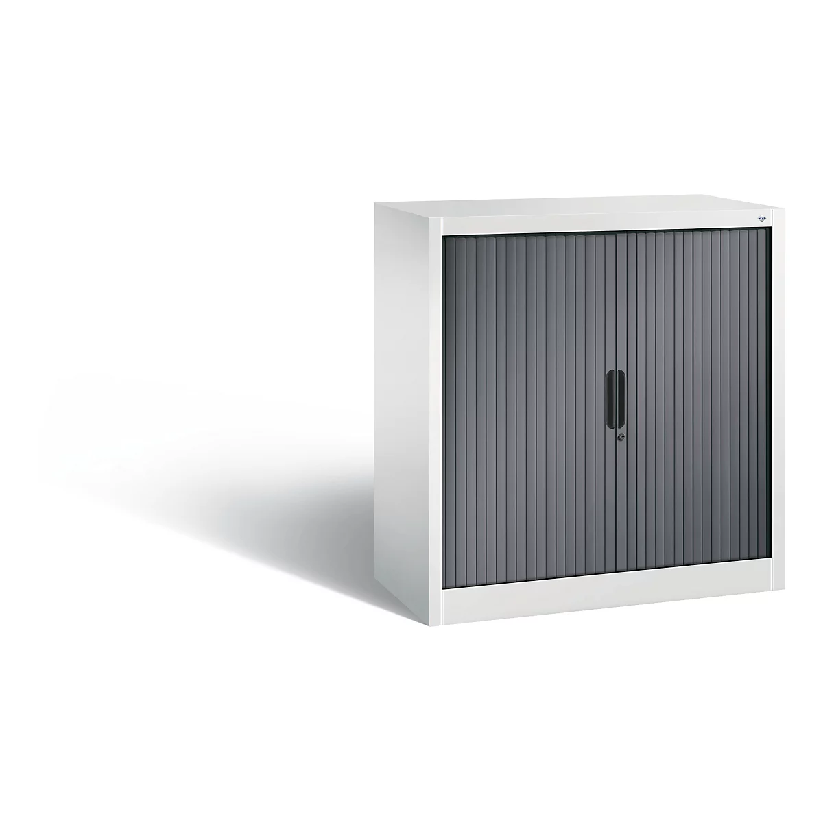 A gray cabinet with roller shutter against a white background.