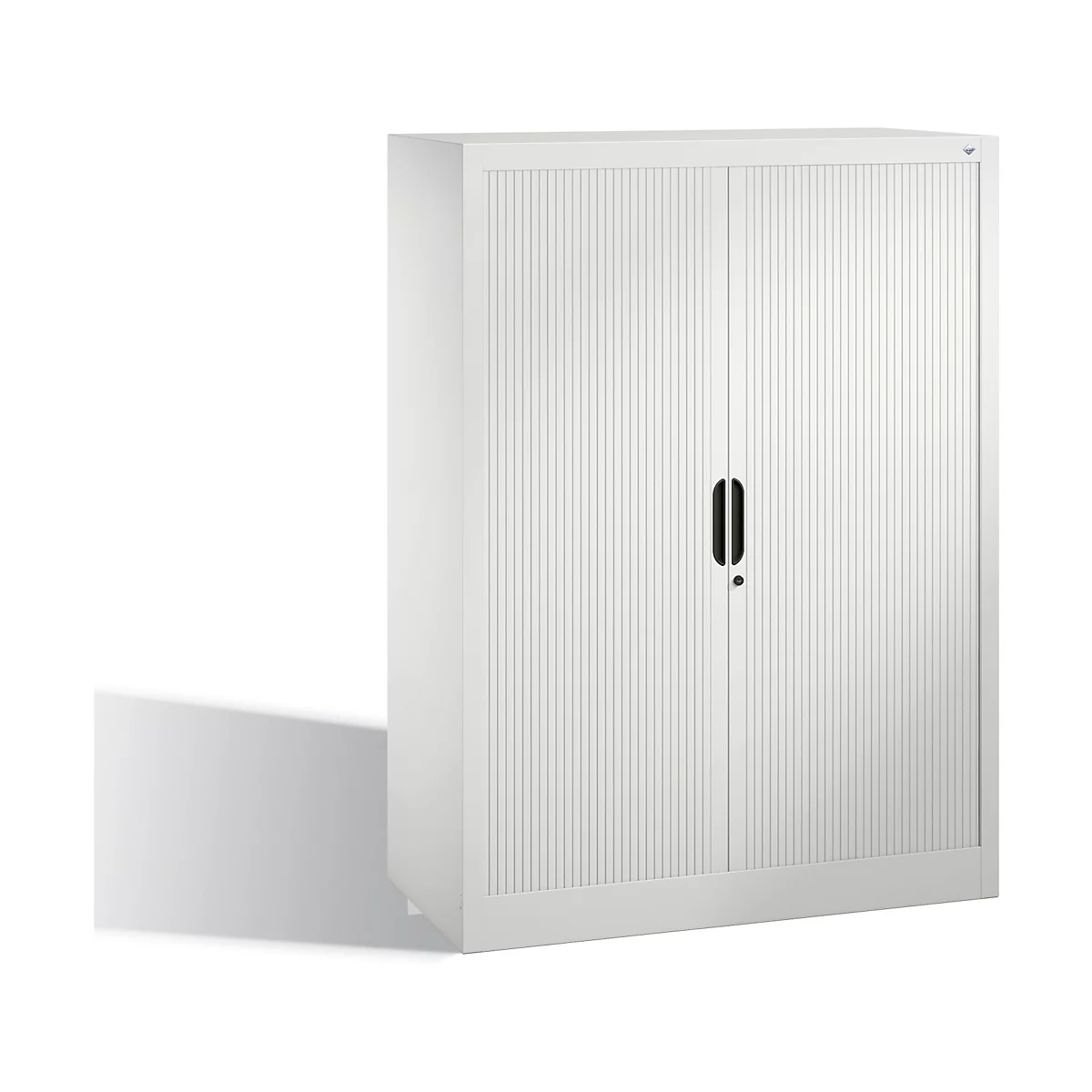White cabinet with two doors and vertical grooves, black handle. Shadow.