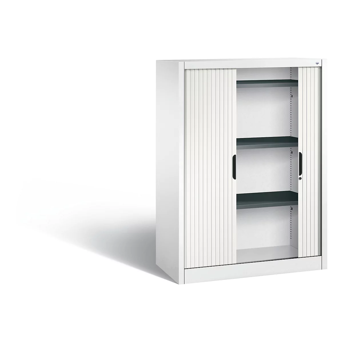 White filing cabinet with roller shutter, open. Dark shelves visible.