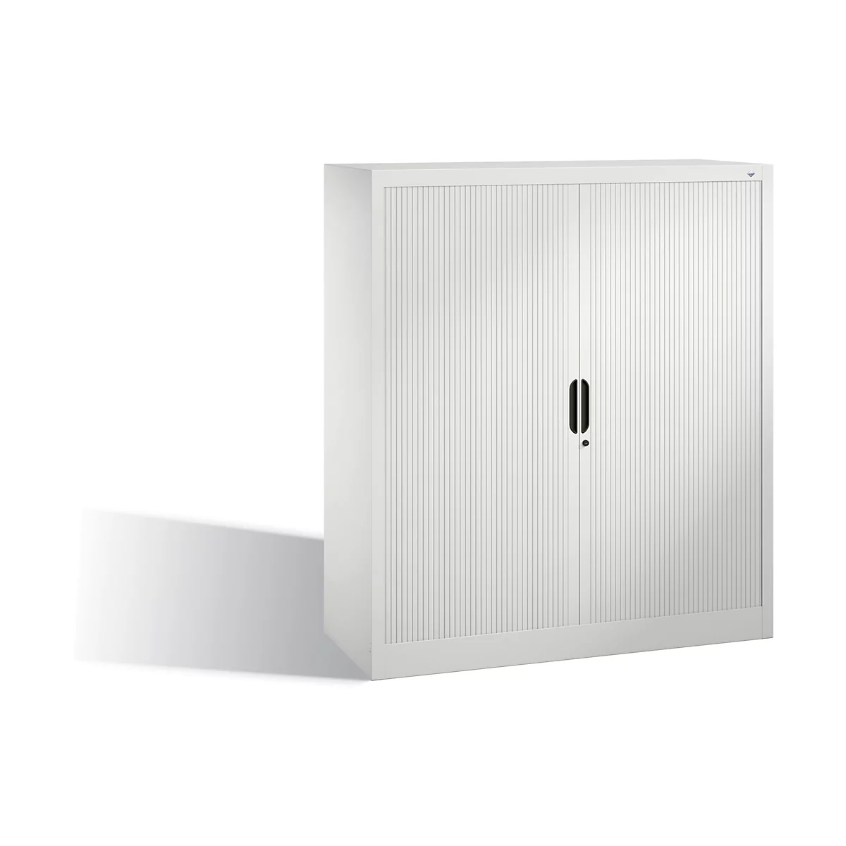 White cabinet with a grooved surface and two doors. Black handle and lock.
